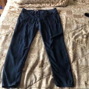 Fragile blue pull up jeans.